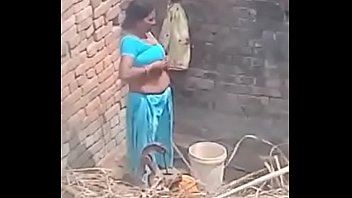 My Neighbour Aunty Bathing Displaying Her Ginormous Boobs.
